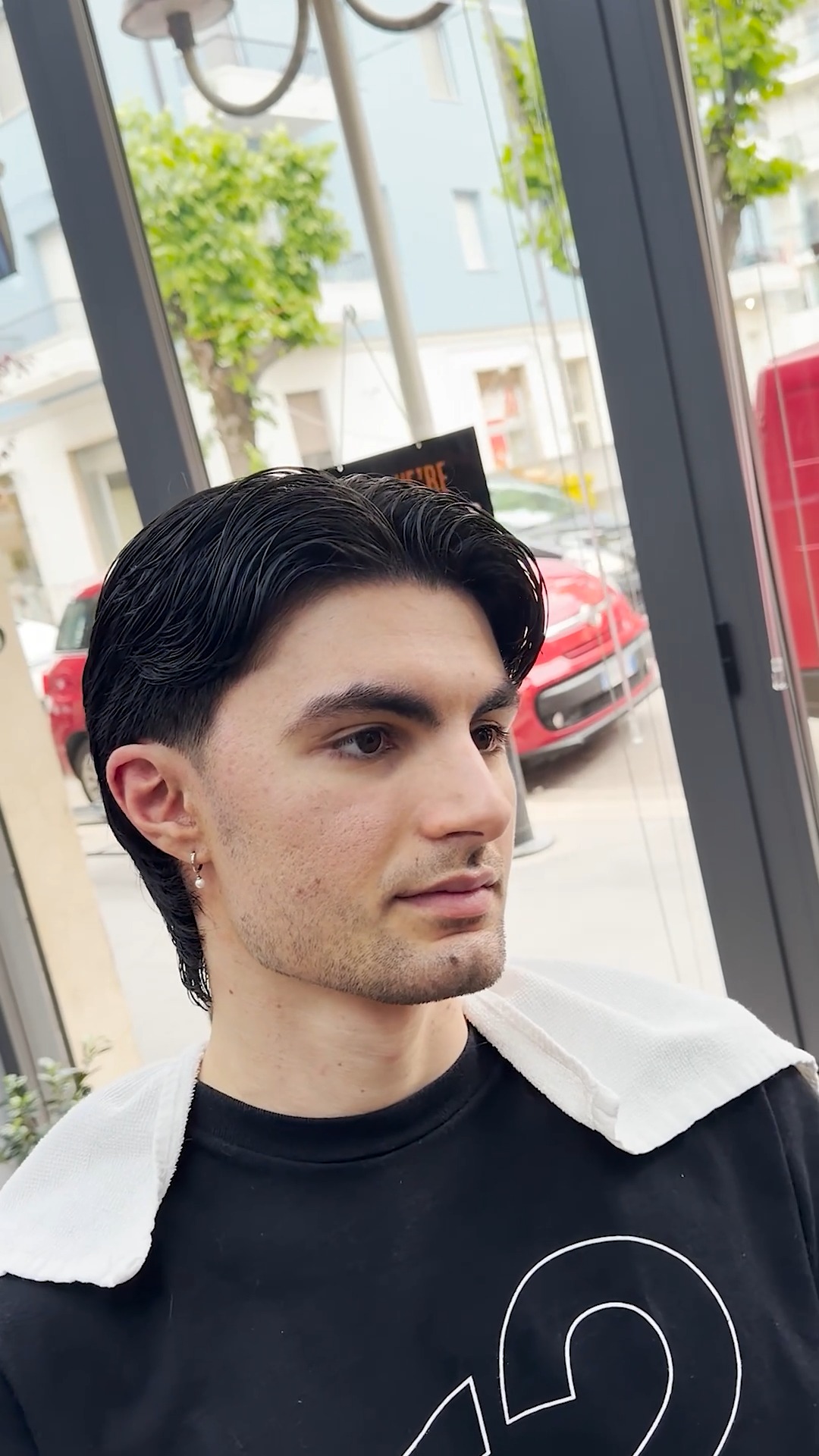 Taglio mullet su capelli lunghi realizzato in barberia